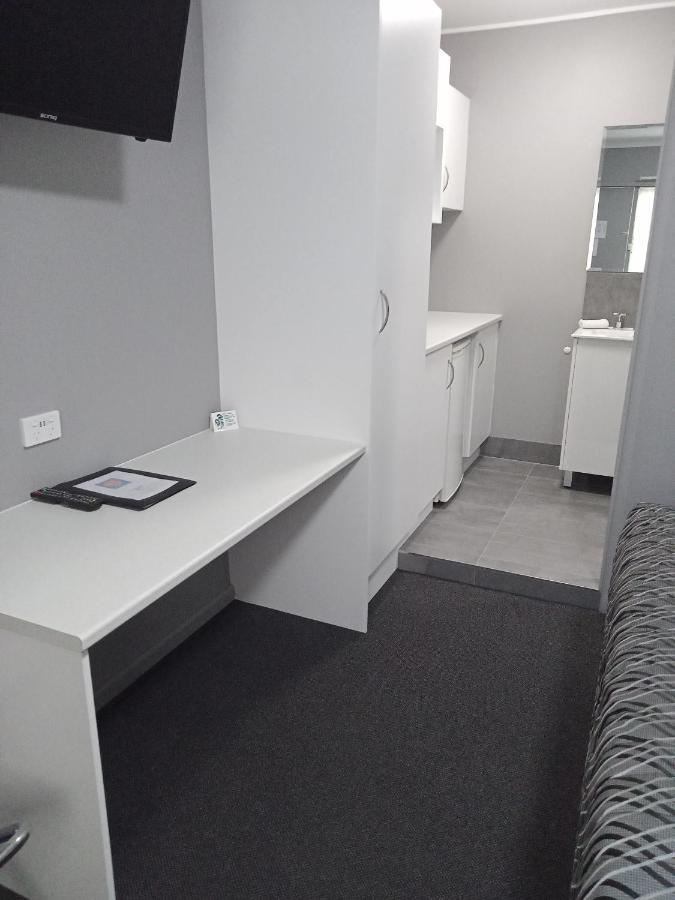 Solomon Inn Motel Figtree วูลองกอง ภายนอก รูปภาพ