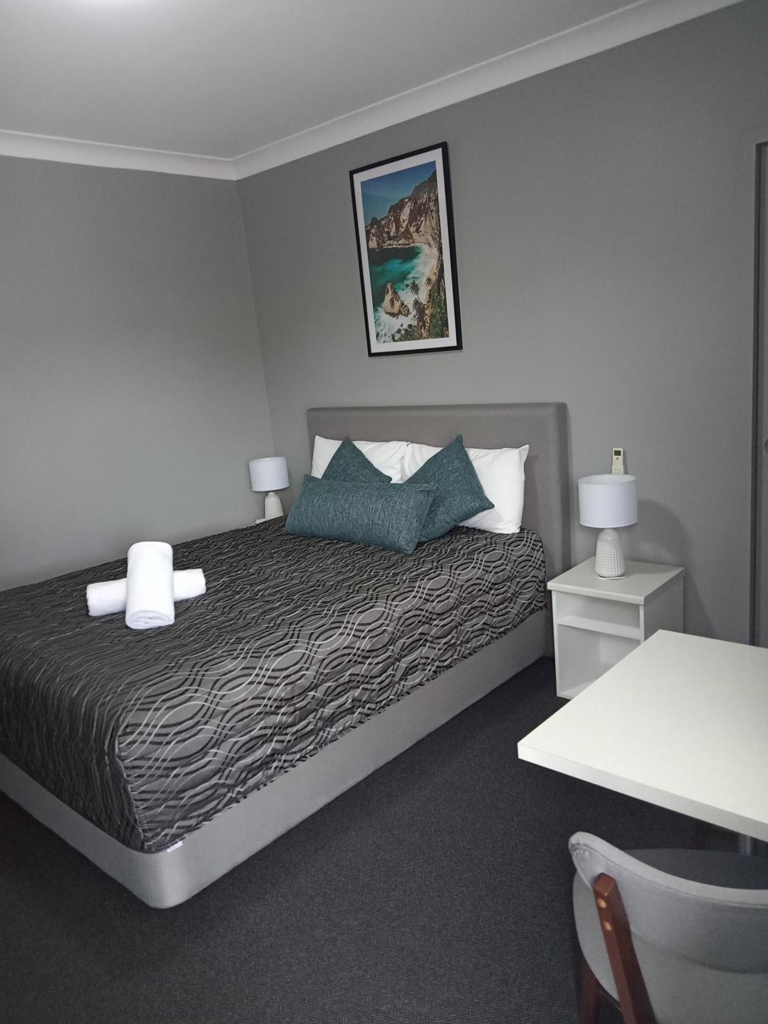 Solomon Inn Motel Figtree วูลองกอง ภายนอก รูปภาพ