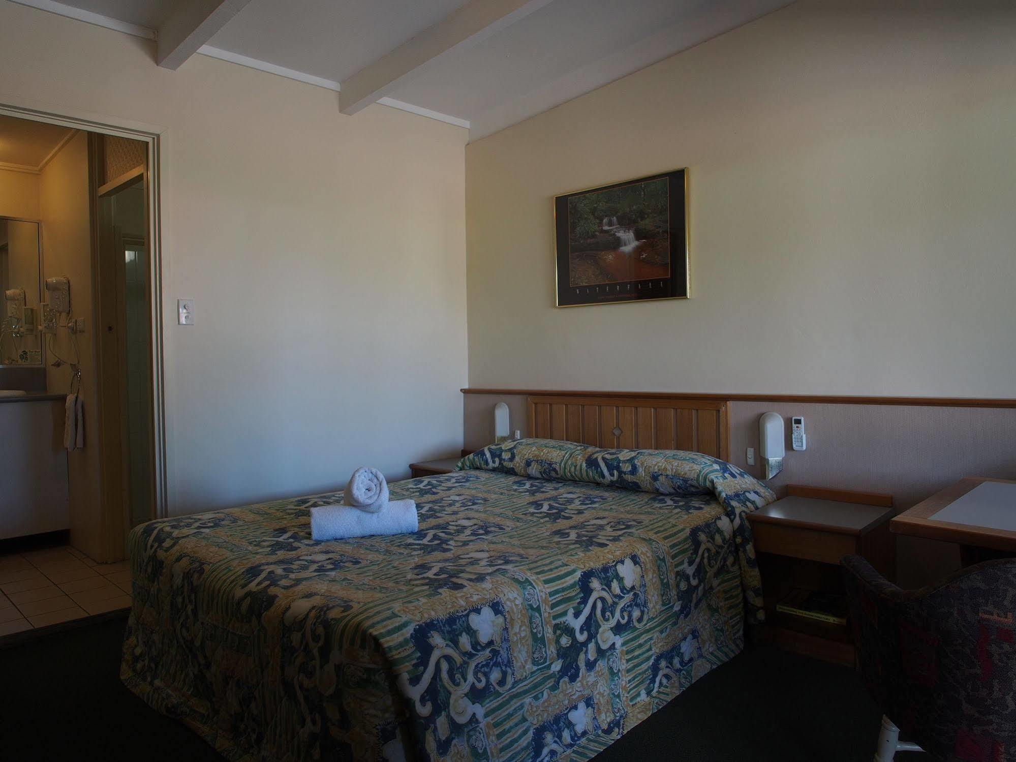 Solomon Inn Motel Figtree วูลองกอง ภายนอก รูปภาพ